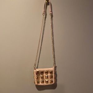 Used cream/off white gold studded Betsy Johnson crossbody bag. Minor scuffs.